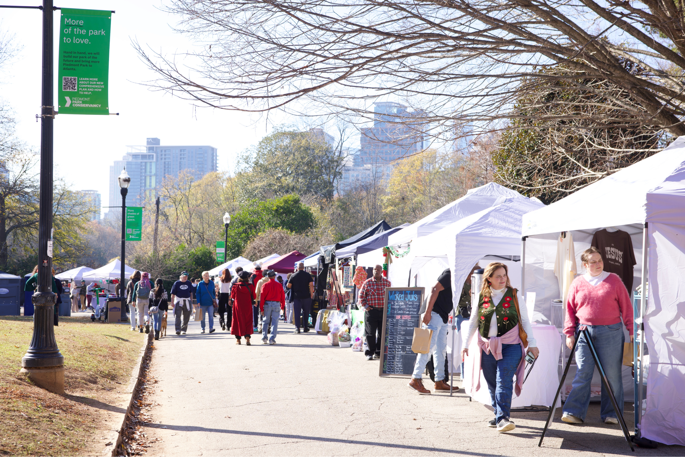 Crowd at previous market in Piedmont Park