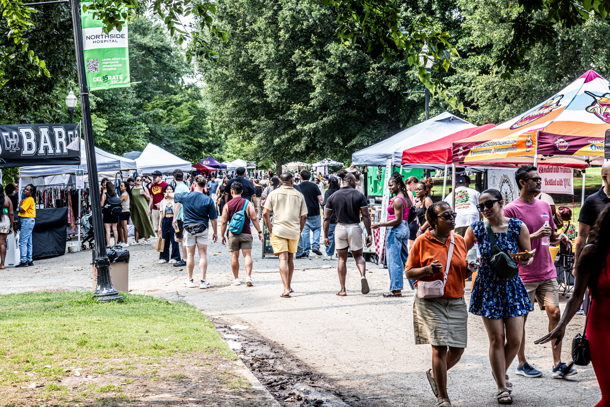 Crowd at previous market in Piedmont Park